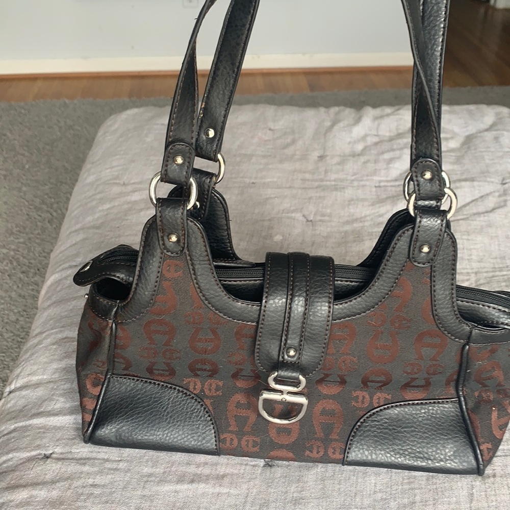Etienne Aigner leather and pattern fabric purse